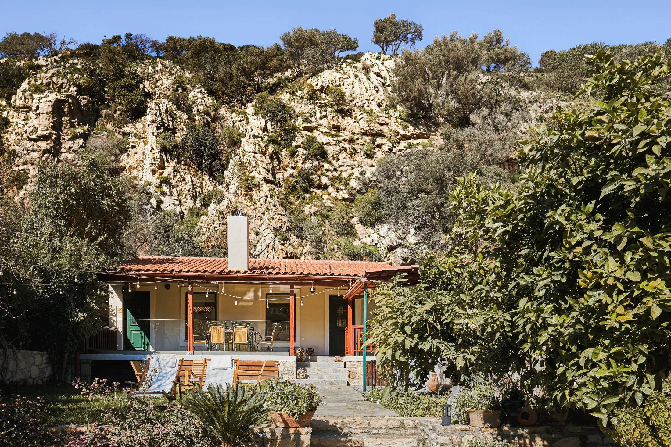 Yiamas Seaside Cottage exterior below the hills of Paleokastro Heraklion Crete