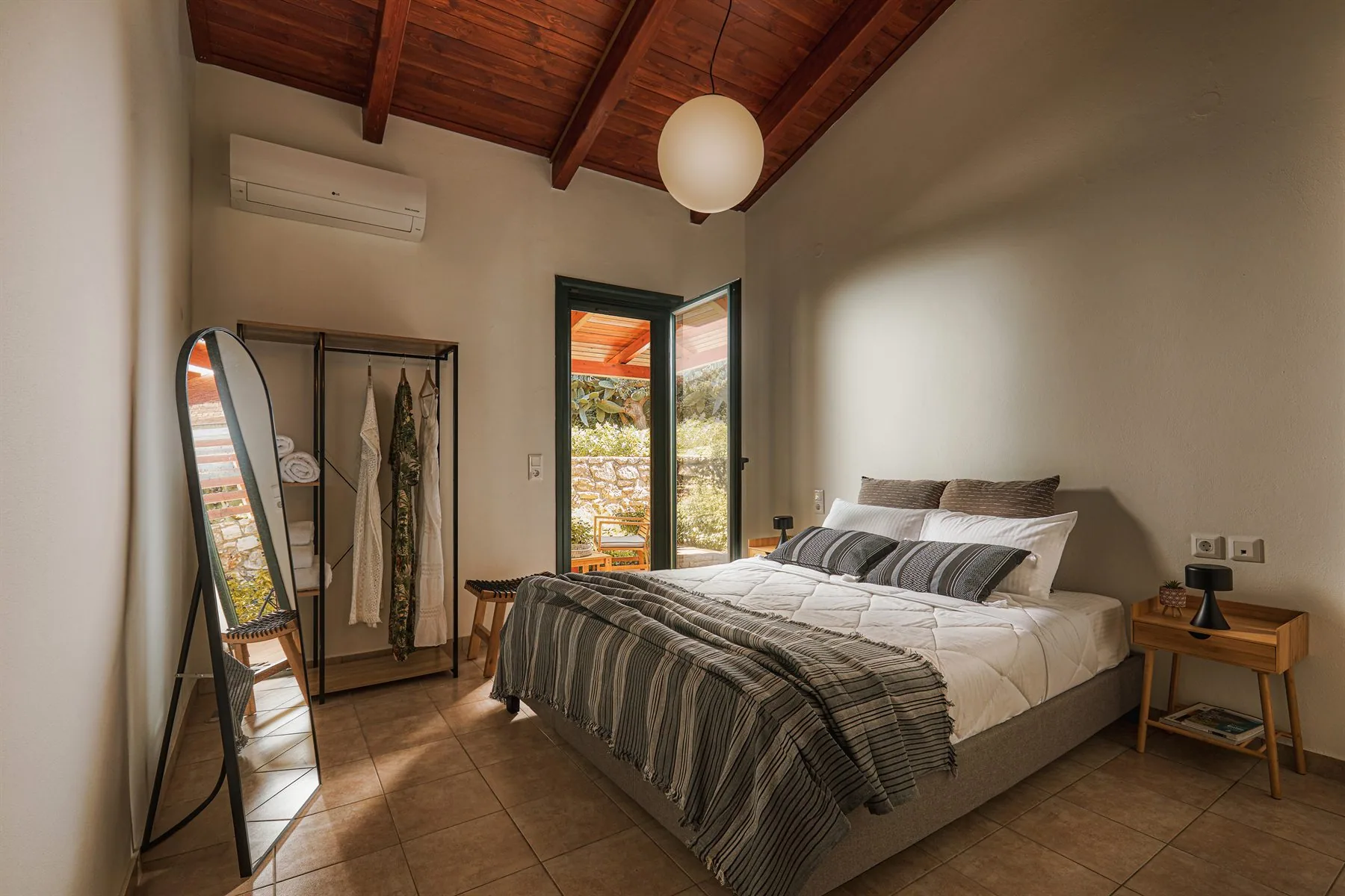 King bedroom with natural light at Yiamas house in Paleokastro Heraklion Crete