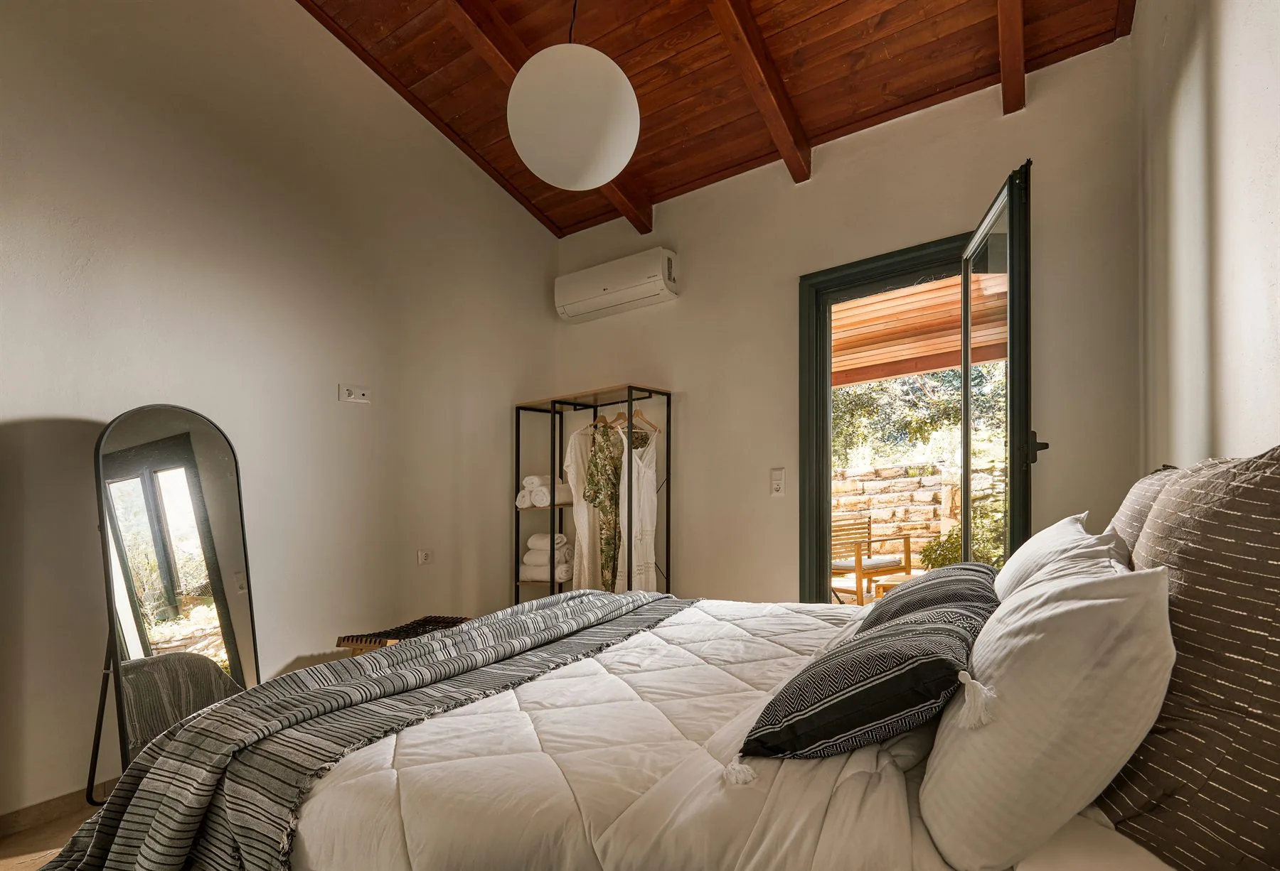 King bedroom details and soft bedding at Yiamas Seaside Cottage in Crete King bedroom details and soft bedding at Yiamas Seaside Cottage in Crete