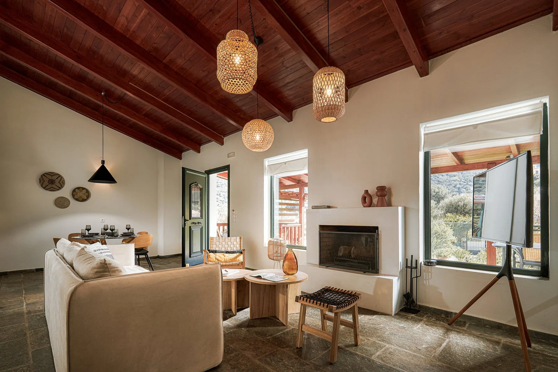 Comfortable living room with fireplace at Yiamas house in Paleokastro
