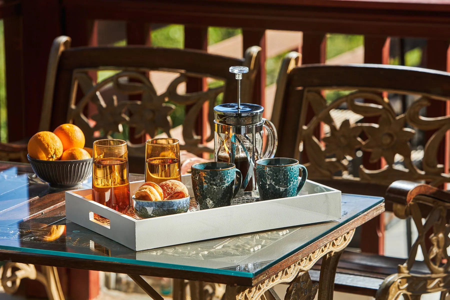 Outdoor breakfast under citrus trees at Yiamas Seaside Cottage in Crete Outdoor breakfast under citrus trees at Yiamas Seaside Cottage in Crete