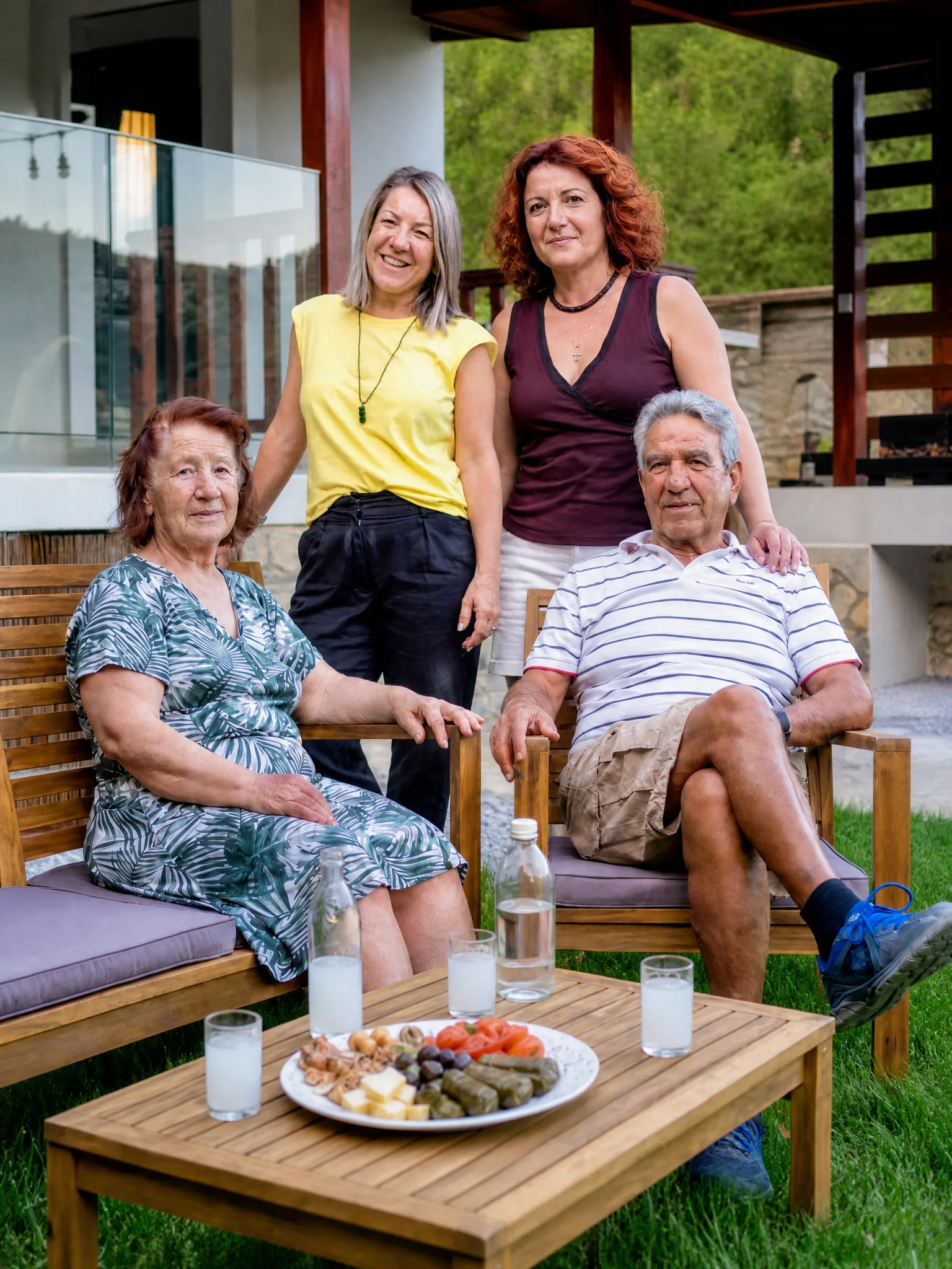 The Yiamas family hosts in the garden at Yiamas Seaside Cottage The Yiamas family hosts in the garden at Yiamas Seaside Cottage